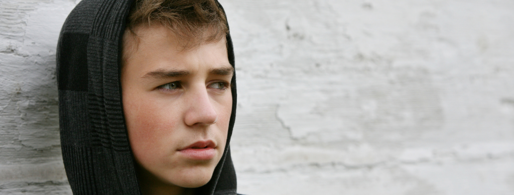 young boy troubled look