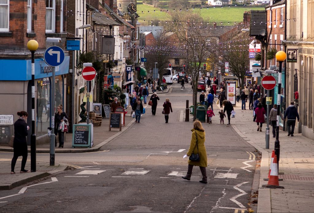 People walking on a UK high street; human trafficking facts