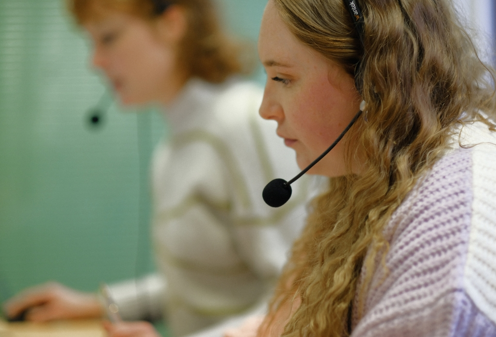Unseen's helpline advisors take calls to the Modern Slavery & Exploitation Helpline