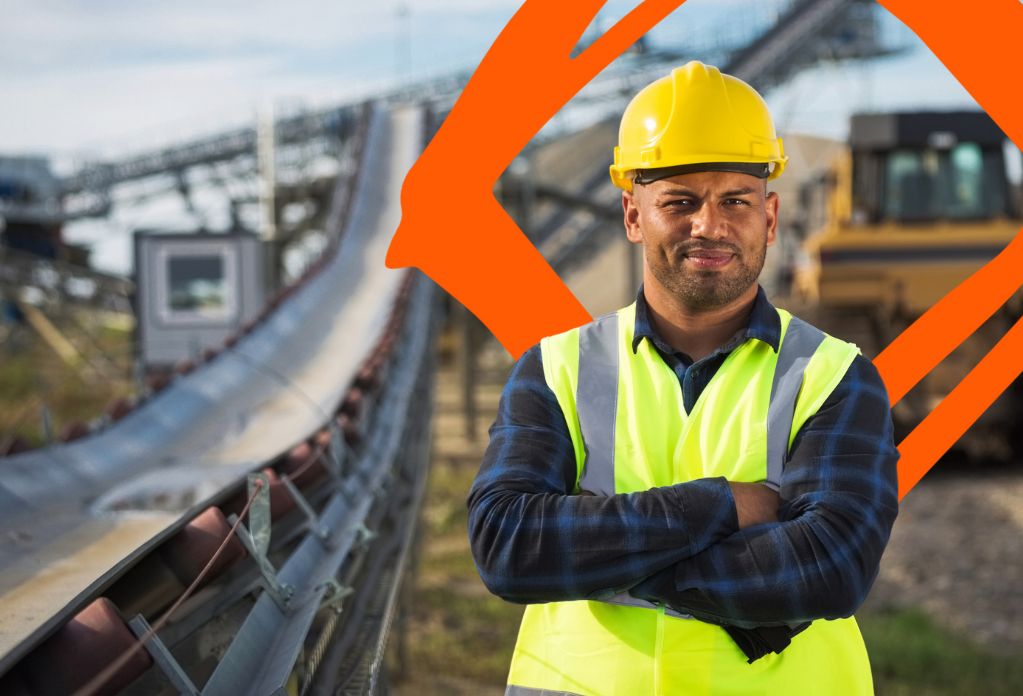 Unseen business impact report 2023. Construction worker facing the camera with arms crossed.