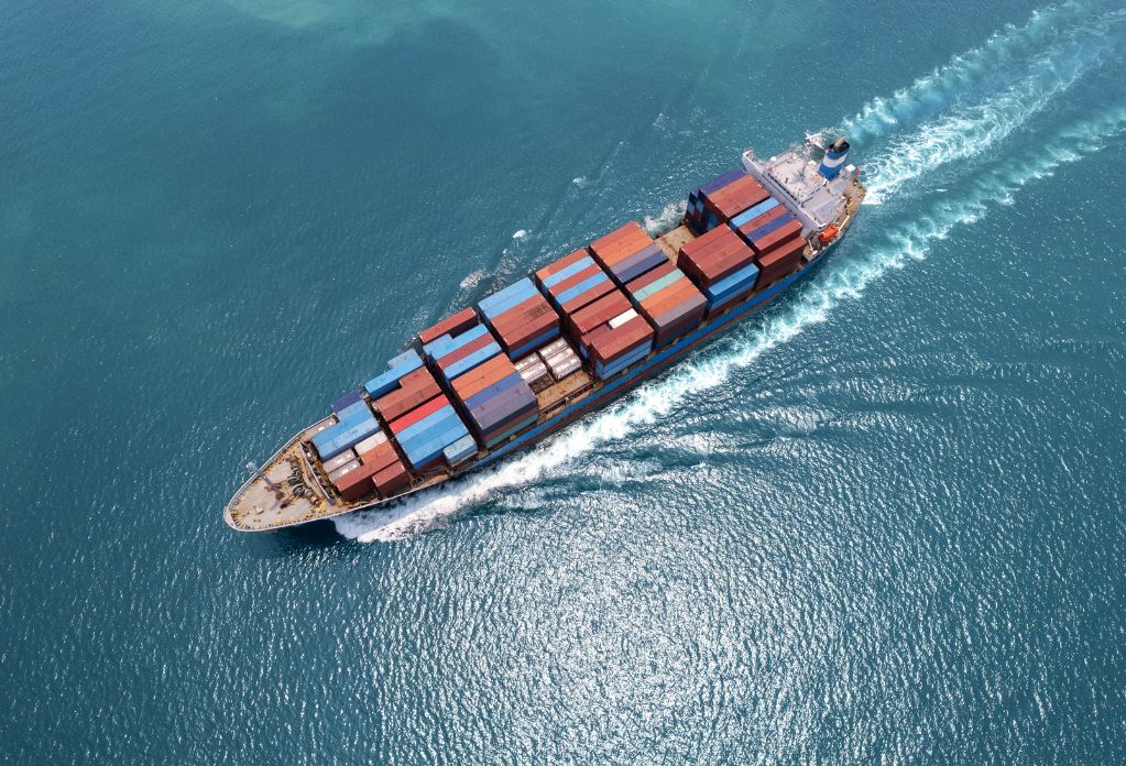 Top view logistics and transportation of container cargo ship.